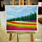 Paysage fleuri aux pastels secs